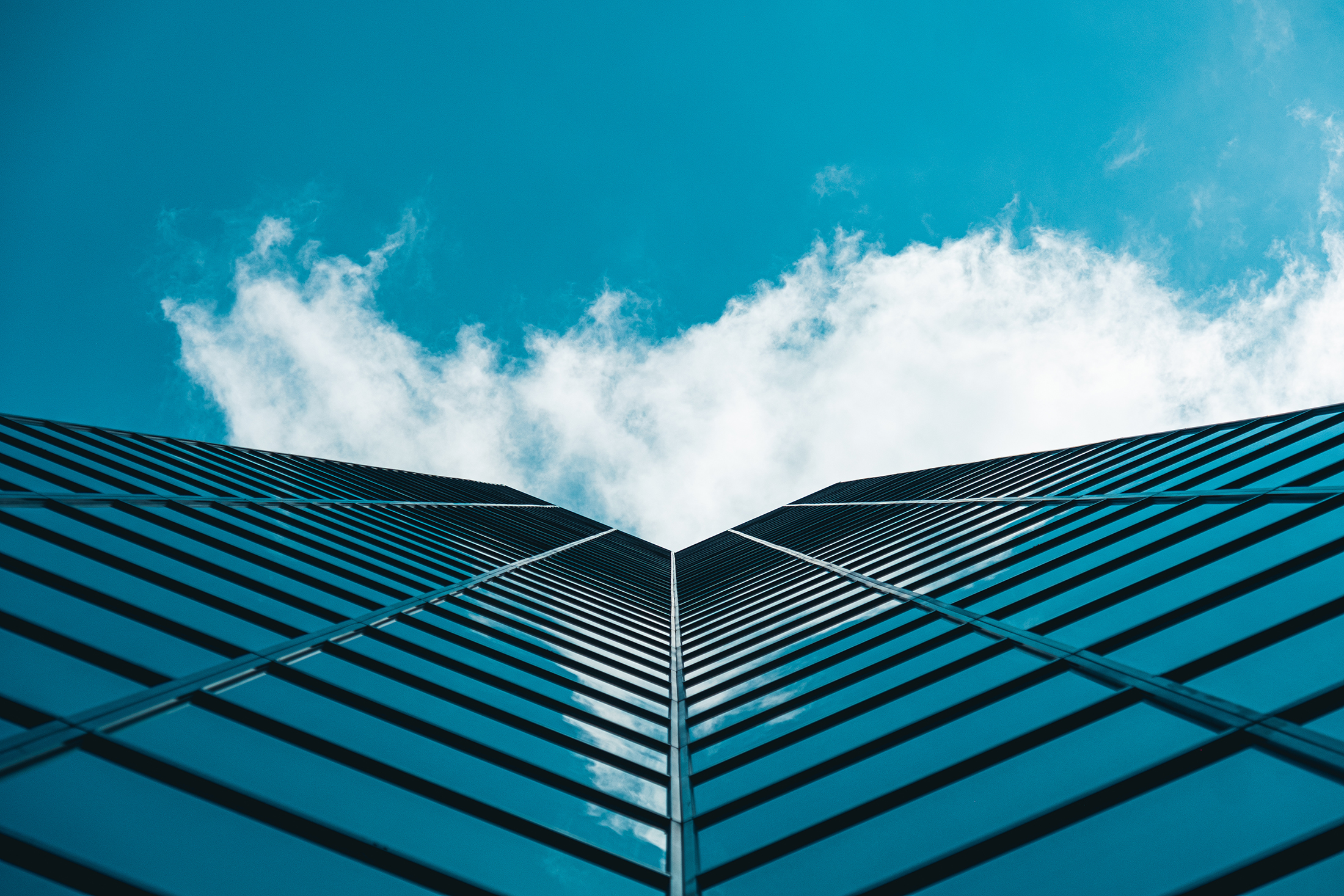 Dramatic perspective on high-rise skyscraper office building wit